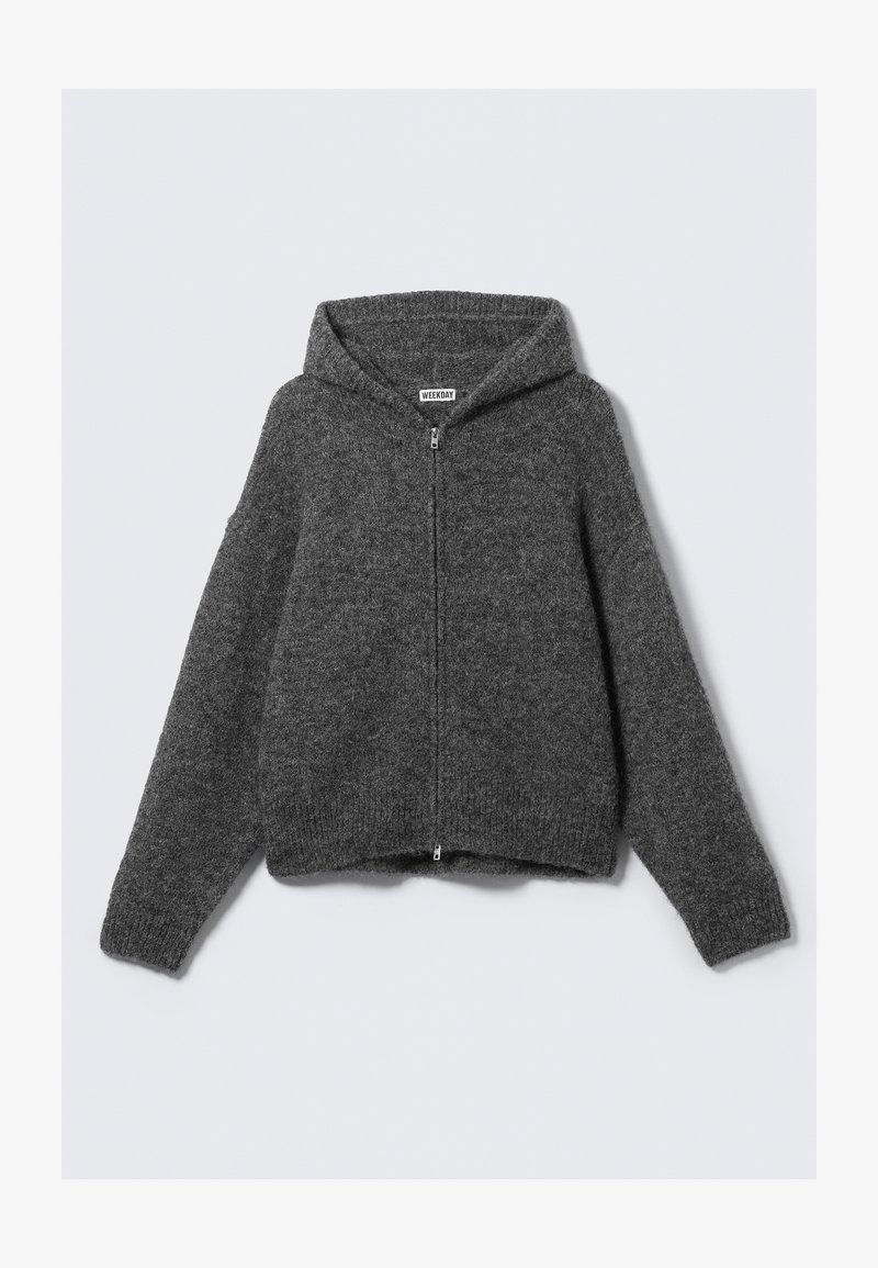 Hoodie zippé gris foncé en maille avec des manches longues, des poignets côtelés et une étiquette portant la mention "WEEKDAY" à l'intérieur du col.