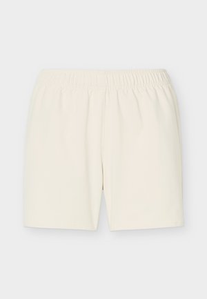 Ecrü, rugalmas derékpántos rövidnadrág, egyenes szabással, könnyű anyagból, egyszínű háttér előtt bemutatva.