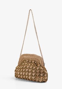 Woven metallic gold handbag with a chain strap, rounded shape, textured fabric, and gathered design, featuring a zippered closure.