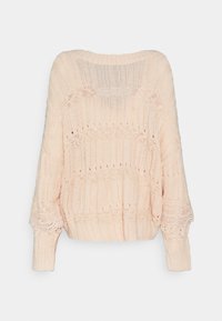Maglione a maglia in morbido pesca, con una vestibilità ampia, costine testurizzate, modelli a trama aperta e maniche larghe.