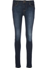 Mörkblå skinny jeans med en blekt effekt, tillverkade av denim, med dragkedja, femficksdesign och kontrasterande sömnad.