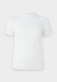 Blusa bianca a maniche corte in pizzo con motivo floreale, colletto alto e dettagli trasparenti sulla spalla.