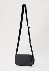 Michael Kors UNISEX - Torba preko tijela - black