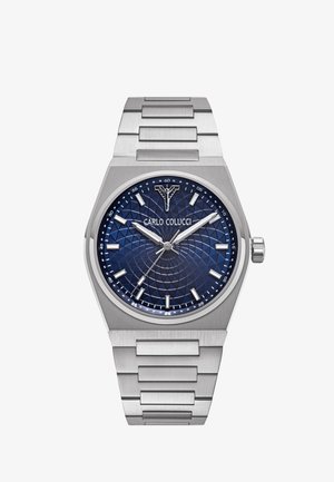 Orologio da polso in metallo argento con quadrante blu lavorato, indicatori delle ore argentati, tre lancette che mostrano le 10:10:35 e logo "Carlo Colucci" sotto le 12.