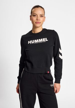 Sudadera negra hecha de una mezcla de algodón, con el logo "HUMMEL" en blanco, cuello redondo acanalado y acentos en forma de chevron en las mangas.