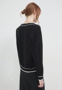 Calliope Strickjacke - nero