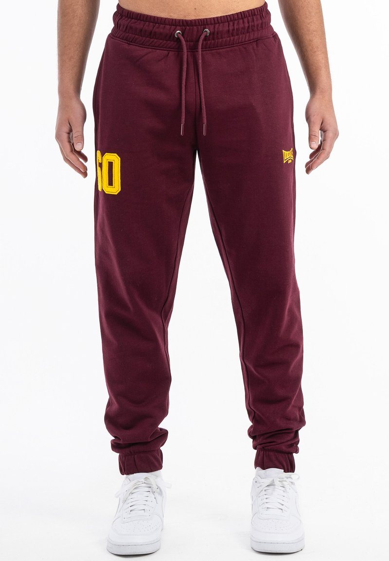 Lonsdale JOGGING NORMALE PASSFORM SUMBURGH - Treningo apatinė dalis - oxblood yellow