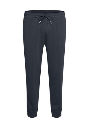 Marineblauwe sweatpants met een elastische tailleband, een trekkoord, zijzakken en een tapered leg ontwerp. Zacht materiaal en een gladde textuur.