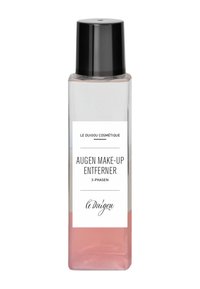 Klarer Flakon mit schwarzem Deckel, der einen dreiphasigen Augen-Make-up-Entferner enthält. Das Etikett hat einen weißen Hintergrund mit schwarzem Text und einer rosa farbene Flüssigkeit.