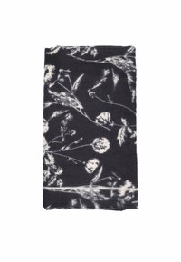 Coperta scura con un intricato motivo floreale bianco, caratterizzata da vari fiori e foglie su un tessuto morbido e testurizzato.