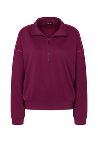 Pullover lungo a maniche con zip a quarto, colletto alto, polsini a costine, orlo elasticizzato e sottile piping rosa brillante lungo le spalle e i lati.