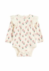 Ilga rankovė bodis kreminės spalvos su raudonais ir žaliais gėlėtų raštu, turi nėrinių volaną aplink apykaklę ir spaudės uždarymą apačioje.