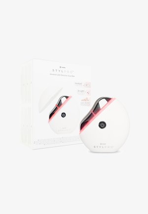 Heated LED electric gua sha in white with pink accents. Rounded shape with a glossy black button. Packaged in a white box with instructions.