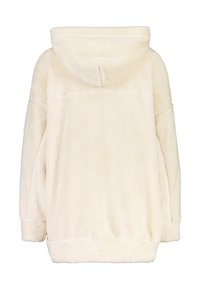 Sudadera con capucha de color crema, hecha de un tejido suave y esponjoso. Presenta un diseño holgado con hombros caídos y puños y dobladillo acanalados.