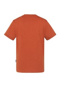 T-shirt z krótkim rękawem w stonowanej pomarańczowej tonacji, wykonany z teksturowanej tkaniny, z okrągłym dekoltem i małą naszywką z boku.