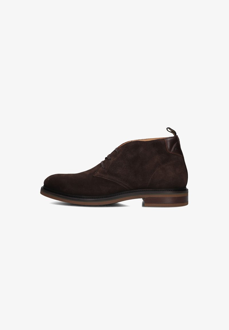 Braune Wildleder-Stiefeletten mit runder Spitze, Schnürdesign, kontrastierendem Lederabsatz und minimalistischem Stil. Flache Gummisohle.