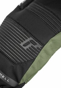 Softshell glove featuring a black nylon upper with ribbed texture, a green leather palm, and a textured logo detail.