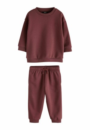 Pull maroon à manches longues avec poignets côtelés et pantalon de jogging assorti avec taille élastique et cordon de serrage.