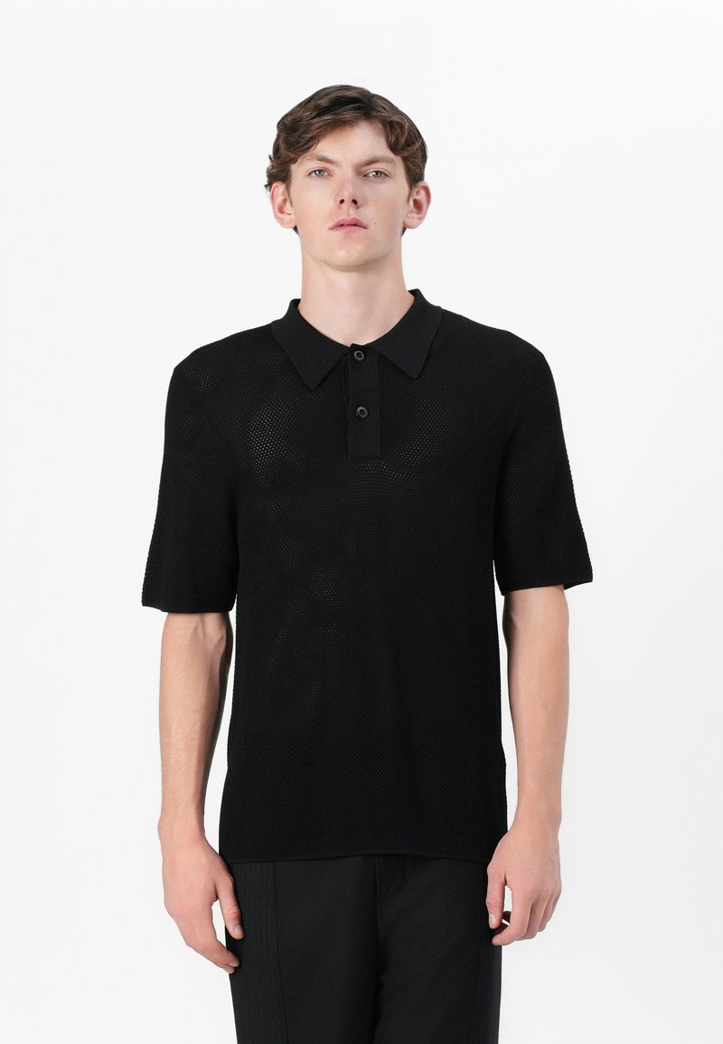 sandro Poloshirt zwart
