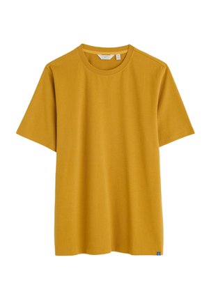 Mustard yellow short-sleeve t-shirt made of cotton, featuring a round neck and a straight fit. Includes a small blue logo tag at the hem.
