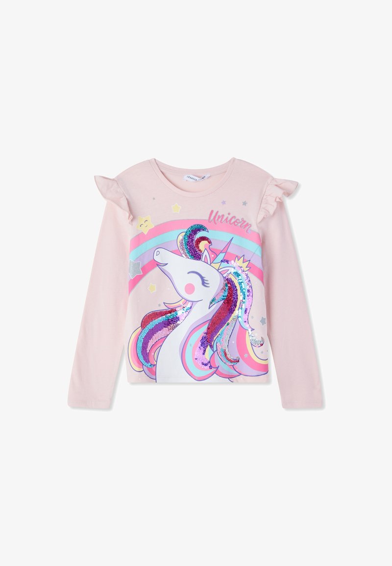 Jasnoróżowa koszula z długim rękawem z falbaniastymi akcentami na ramionach, z grafiką jednorożca ozdobioną tęczowymi cekinami i kolorowymi gwiazdkami.