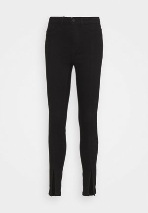 Vaqueros pitillo - black denim