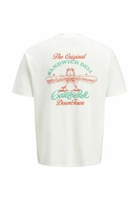 Hvid bomulds t-shirt med et grafisk motiv af en tegneserie kat, der holder en stor sandwich, med teksten "The Original Sandwich Deli" over.