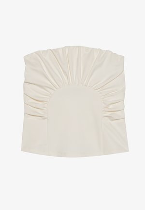 Haut couleur crème avec tissu froncé, présentant un décolleté arrondi et une texture lisse. Le design comprend des plis le long des bords.