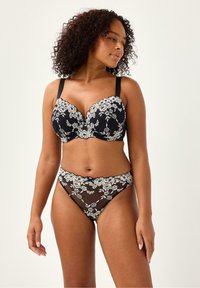 Sorte blonde lingeri sæt med blomsterbroderi i cremefarver, underwire bh med justerbare stropper og matchende højtaljet trusse.