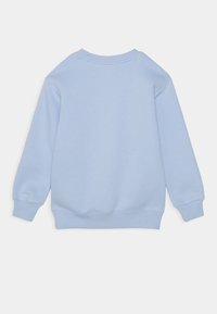Champion CREW NECK UNISEX - Sweatshirt - light blue
