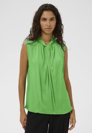 Zelena brezrokavnik bluza z nabrano sprednjo stranjo, izdelana iz gladkega, lahkega materiala. Zaobljen izrez z detajlom v obliki ključavnice.