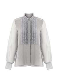 Hellgraue Bluse mit durchscheinenden langen Ärmeln, einer voluminösen Frontpartie und verziertem Muster entlang der Mitte. Knopfverschluss am Kragen.