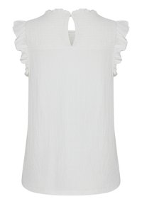Vit ärmlös topp med volangdetaljer vid axlarna, en nyckelhålsöppning bak och ett texturerat tyg med krinklad yta.
