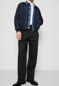 Calvin Klein Kalhoty - black