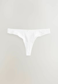 String blanc en coton présentant une texture lisse, un design minimaliste, des côtés fins et un petit nœud décoratif au centre avant.