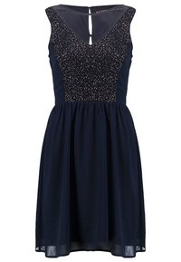 Robe bleu marine à design sans manches, col en V, corsage orné d'un motif scintillant et jupe évasée. Détail dos avec ouverture en œillet.