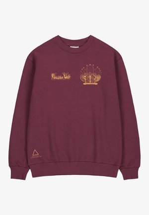 Burgundy sweatshirt with a round neckline, ribbed cuffs, and hem. Features gold embroidery with text and decorative motifs on the front.