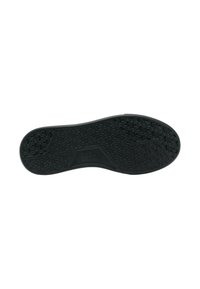 Suola di scarpa nera in gomma con un motivo testurizzato caratterizzato da linee curve, sezioni in rilievo e un logo centrale. Design piatto, aspetto leggero.