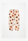 ADAN SOFT PANTS UNISEX - Jogginghose - beige/orange