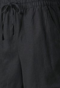 JDY SAY STRING NOOS - Träningsbyxor - black