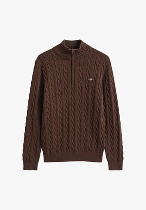 Brauner Pullover mit Zopfmuster, hohem Kragen und Reißverschluss. Verfügt über gerippte Bündchen und Saum, die ein durchgängiges strukturiertes Muster bieten.
