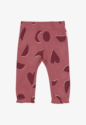 Różowe legginsy dla niemowląt z burgundowymi wzorami serca i półksiężyca oraz falbaniastymi mankietami na kostkach.
