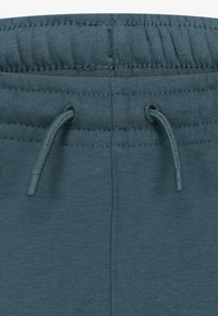 Jordan BROOKLYN PANT UNISEX - Treniņtērpa apakšdaļas - oxidized green