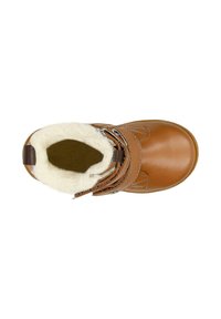 Stivale in pelle marrone con una morbida fodera in pile bianco, colletto imbottito e cerniera laterale per un facile accesso. Design a punta smussata.