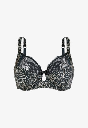 Soutien-gorge noir avec un motif floral beige, doté de bonnets en dentelle, de bretelles réglables et d'un détail en clé à l'avant. Bords festonnés le long de la bande.