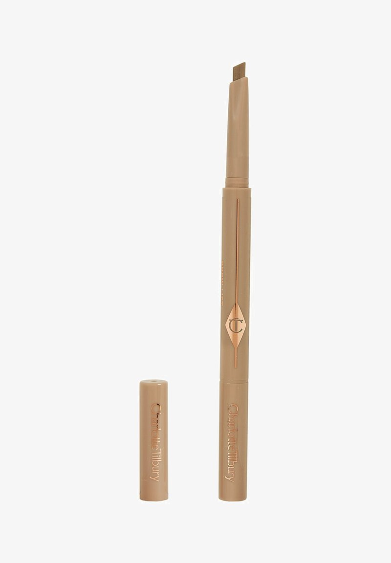Brow pencil with a thin, angled tip and retractable design. Creamy, beige-colored packaging with gold accents and a visible brand logo.