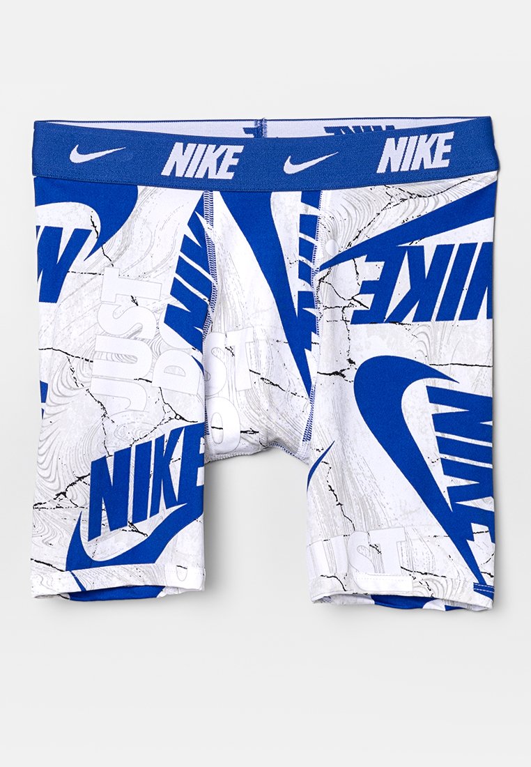 Niebieskie i białe szorty Nike z logo w wyrazistym wzorze oraz hasłem "JUST DO IT" powtarzającym się na teksturowanym tle.