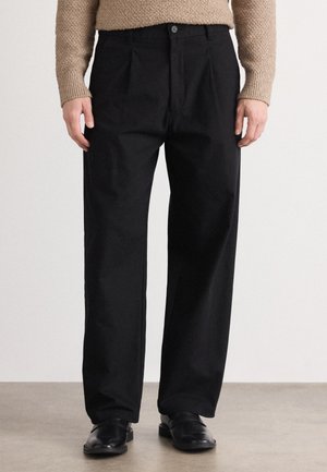 RIKO - Pantaloni - black