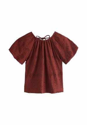 Bluzka w kolorze rdzy z oczkami, krótkimi bufkami, marszczonym dekoltem i zapięciem na troczki z tyłu.