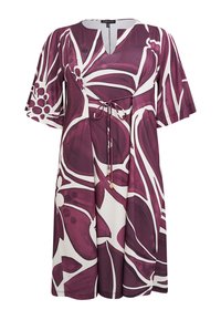 Lilla og hvid blomsterkjole med V-hals, korte flagrende ærmer, snøre i taljen og løs pasform. Blomsterprintet har dristige, abstrakte former.